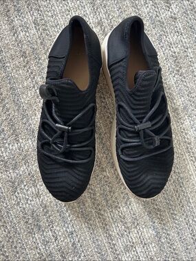 Uggs black slip on sneakers